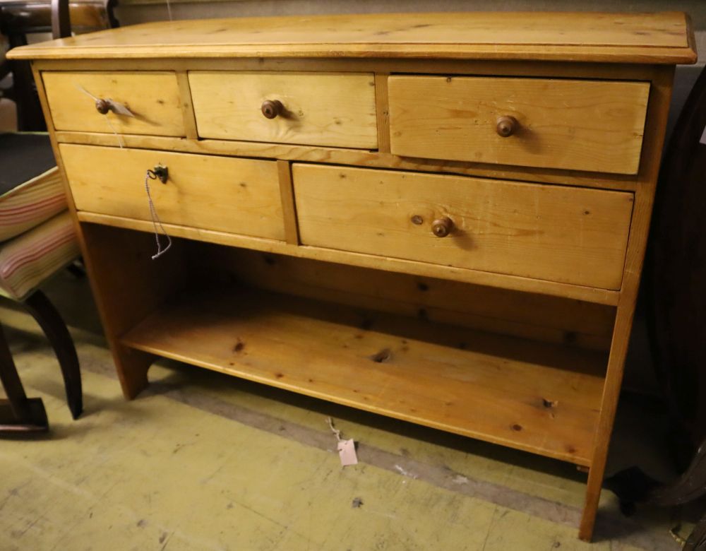 A pine five drawer side cabinet, width 117cm depth 40cm height 87cm